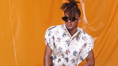 Jaden Smith attends the Louis Vuitton Spring/Summer 2024 womenswear fashion show. He wore a sleeveless cropped top and denim jeans. Boots, glasses, bracelets, rings, and an LV logo belt completed the outfit. (Vianney Le Caer/Invision/AP) Jaden Smith attends the Louis Vuitton Spring/Summer 2024 womenswear fashion show. He wore a sleeveless cropped top and denim jeans. Boots, glasses, bracelets, rings, and an LV logo belt completed the outfit. (Vianney Le Caer/Invision/AP)