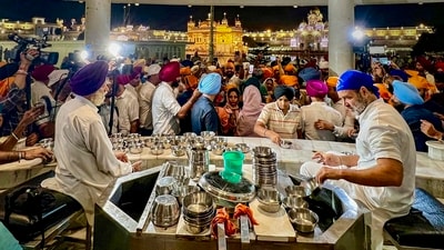 During his visit to the Golden Temple, Rahul Gandhi was observed wearing a blue headscarf as a mark of reverence at the sanctum sanctorum. (PTI) During his visit to the Golden Temple, Rahul Gandhi was observed wearing a blue headscarf as a mark of reverence at the sanctum sanctorum. (PTI)
