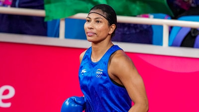 India's Lovlina Borgohain during the women's 66kg-75kg category semifinal boxing match against Thailand's Baison Maneekon (PTI) India's Lovlina Borgohain during the women's 66kg-75kg category semifinal boxing match against Thailand's Baison Maneekon (PTI)
