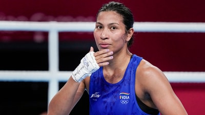 Lovlina Borgohain after winning the women's 66kg-75kg category semifinal boxing match against Thailand's Baison Maneekon at the 19th Asian Games (PTI)