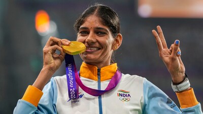 Gold medallist Parul Chaudhary poses for photo during the presentation ceremony of the women's 5000m athletics event at the 19th Asian Games (PTI)