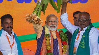 Prime Minister Narendra Modi being felicitated during an event organised for laying of foundation stone of various developmental projects in Nizamabad in Telangana on Tuesday. (PTI) Prime Minister Narendra Modi being felicitated during an event organised for laying of foundation stone of various developmental projects in Nizamabad in Telangana on Tuesday. (PTI)