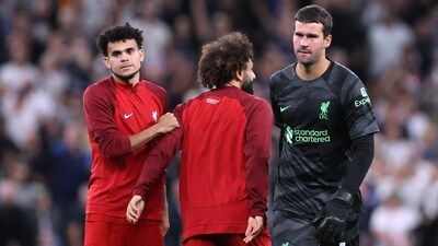 Liverpool's Alisson, Mohamed Salah and Luis Diaz look dejected after the match (REUTERS)