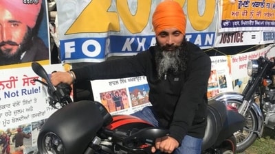 Hardeep Singh Nijjar, wanted in India for targeted killings in Punjab, poses on a motorcycle in front of the Sikhs For Justice float in Surrey. (Courtesy: Sikhs For Justice) Hardeep Singh Nijjar, wanted in India for targeted killings in Punjab, poses on a motorcycle in front of the Sikhs For Justice float in Surrey. (Courtesy: Sikhs For Justice)