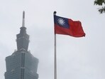 A Taiwan national flag flutters near the Taipei 101 building at the in Taipei. A Taiwan national flag flutters near the Taipei 101 building at the in Taipei.