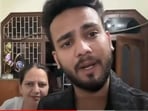 Elvish Yadav with his mother from a vlog.