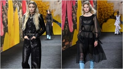 Gigi Hadid and another model present Virginie Viard's Chanel spring collection during Paris Fashion Week. (AFP ) Gigi Hadid and another model present Virginie Viard's Chanel spring collection during Paris Fashion Week. (AFP )