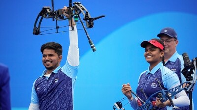 India's Deotale Ojas Pravin, left, and Vennam Jyothi Surekha celebrates after competes in the compound mixed team archery gold medal match at the 19th Asian Games in Hangzhou (AP) India's Deotale Ojas Pravin, left, and Vennam Jyothi Surekha celebrates after competes in the compound mixed team archery gold medal match at the 19th Asian Games in Hangzhou (AP)