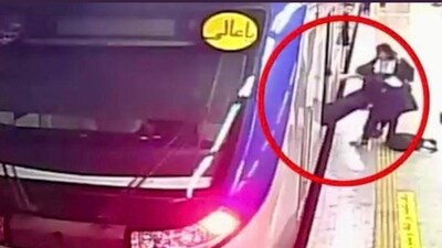 Screengrab of Armita Geravand being dragged from train. Screengrab of Armita Geravand being dragged from train.