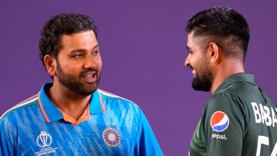 India's captain Rohit Sharma, left and Pakistan's captain Babar Azam chat during captain's press conference on the eve of ICC Men's Cricket World Cup in Ahmedabad (AP) India's captain Rohit Sharma, left and Pakistan's captain Babar Azam chat during captain's press conference on the eve of ICC Men's Cricket World Cup in Ahmedabad (AP)