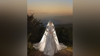 Mahira Khan's lehenga set is custom-designed by Faraz Manan. The bridal ensemble features a cropped blouse featuring a wide neckline, full-length sleeves, a plunging back, intricate gold and silver sequin embellishments, detailed embroidery, and a midriff-baring short hem. (Instagram/@mahirahkhan) Mahira Khan's lehenga set is custom-designed by Faraz Manan. The bridal ensemble features a cropped blouse featuring a wide neckline, full-length sleeves, a plunging back, intricate gold and silver sequin embellishments, detailed embroidery, and a midriff-baring short hem. (Instagram/@mahirahkhan)