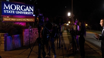 Media gather outside the entrance to Morgan State University after reports of a shooting at the campus Tuesday, Oct. 3, 2023, in Baltimore. (AP Photo/Julia Nikhinson) (AP) Media gather outside the entrance to Morgan State University after reports of a shooting at the campus Tuesday, Oct. 3, 2023, in Baltimore. (AP Photo/Julia Nikhinson) (AP)