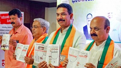 Former CM Bommai, state's BJP President Nalin Kumar Kateel and former minister Govind Karjol. (PTI) Former CM Bommai, state's BJP President Nalin Kumar Kateel and former minister Govind Karjol. (PTI)