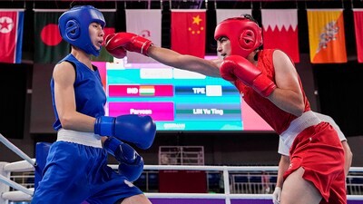India's Parveen Hooda and Chinese Taipei's Lin Yu Ting during the women's 54-57kg semifinal boxing match at the 19th Asian Games (PTI)