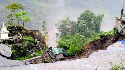 A portion of a road washed away near Lhonak Lake in North Sikkim district, (PTI) A portion of a road washed away near Lhonak Lake in North Sikkim district, (PTI)