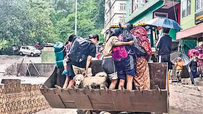 People being rescued from a flooded area in north Sikkim on Wednesday. (PTI) People being rescued from a flooded area in north Sikkim on Wednesday. (PTI)