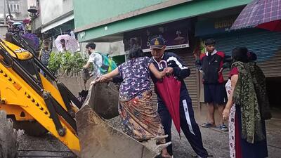 Residents being evacuated in Sikkim on Wednesday. (AFP) Residents being evacuated in Sikkim on Wednesday. (AFP)