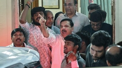 AAP MP Sanjay Singh shouts slogans with his supporters as he is being taken away from his residence after being arrested by the Enforcement Directorate in connection with the Delhi Liquor Policy case, in New Delhi on Wednesday. (ANI) AAP MP Sanjay Singh shouts slogans with his supporters as he is being taken away from his residence after being arrested by the Enforcement Directorate in connection with the Delhi Liquor Policy case, in New Delhi on Wednesday. (ANI)
