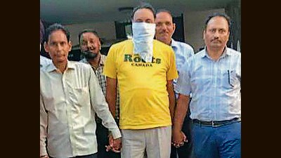 The accused in Vigilance Bureau’s custody. (ht photo) The accused in Vigilance Bureau’s custody. (ht photo)