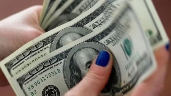 Among adults with an annual income of $100,000 or more, close to 20% say they expect their incomes to fall in the next four weeks. (File)