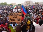 FILE - Nigeriens participate in a march called by supporters of coup leader Gen. Abdourahmane Tchiani in Niamey, Niger, Sunday, July 30, 2023. The French troops being forced out of Niger were seen as a key line of decadelong defense amid efforts led by the West, particularly U.S. and France, to fight against jihadi violence in Africa’s hard-hit Sahel region. The sign reads: "Down with France, long live Putin." (AP Photo/Sam Mednick, File) FILE - Nigeriens participate in a march called by supporters of coup leader Gen. Abdourahmane Tchiani in Niamey, Niger, Sunday, July 30, 2023. The French troops being forced out of Niger were seen as a key line of decadelong defense amid efforts led by the West, particularly U.S. and France, to fight against jihadi violence in Africa’s hard-hit Sahel region. The sign reads: "Down with France, long live Putin." (AP Photo/Sam Mednick, File)