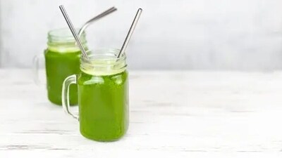 Detoxifying the body with coriander, mint and curry leaves juice helps in providing support to hair health as well. (Unsplash)