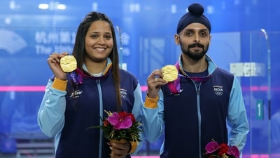 Indian squash pair of Dipika Pallikal and Harinder Pal Singh Sandhu clinch a gold medal in mixed doubles event at the ongoing Asian Games, in Hangzhou on Thursday (Seshadri Sukumar) Indian squash pair of Dipika Pallikal and Harinder Pal Singh Sandhu clinch a gold medal in mixed doubles event at the ongoing Asian Games, in Hangzhou on Thursday (Seshadri Sukumar)