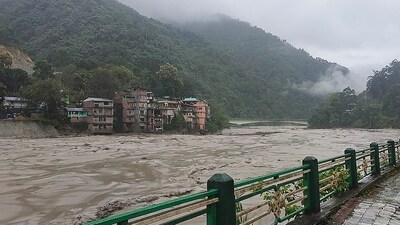 At least fourteen people have died and 102 others, including 22 army personnel, were missing after the cloudburst over Lhonak Lake in North Sikkim triggered a flash flood in the Teesta river basin, officials said on Thursday. (AFP) At least fourteen people have died and 102 others, including 22 army personnel, were missing after the cloudburst over Lhonak Lake in North Sikkim triggered a flash flood in the Teesta river basin, officials said on Thursday. (AFP)