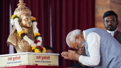 PM Modi pays tribute to Rani Durgavati in Jabalpur. Among other projects, he laid the foundation stone of multiple road development projects to be built at a cumulative cost of about <span class='webrupee'>₹</span>1,475 crore and also flagged off two new train services in the state. (PTI) PM Modi pays tribute to Rani Durgavati in Jabalpur. Among other projects, he laid the foundation stone of multiple road development projects to be built at a cumulative cost of about <span class='webrupee'>₹</span>1,475 crore and also flagged off two new train services in the state. (PTI)