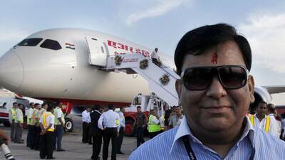 Rohit Nandan poses with the-new-Boeing 787 Dreamliner aircraft at IGI-Airport in 2012. Nandan was the managing director and chairman of the state-run airline for four years between 2011 and 2015. (HT File Photo)