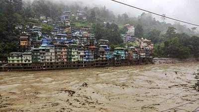 Six bridges and several houses have been washed away in Sikkim following the flash floods. (PTI)