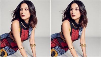 Shehnaaz styled her look with golden jewellery, including a chain necklace and bracelets stacked on her wrist, and finished off her chic look with a pair of bright pink pumps. (Instagram/@shehnaazgill)