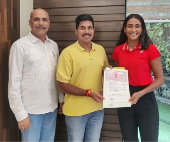 Rutuja Bhosale (right) with Punit Balan (centre), chairman of Punit Balan Group. PBG is dedicated to fostering Indian sporting talent across diverse disciplines, and Rutuja has been in partnership with them since June of the previous year. Rutuja Bhosale (right) with Punit Balan (centre), chairman of Punit Balan Group. PBG is dedicated to fostering Indian sporting talent across diverse disciplines, and Rutuja has been in partnership with them since June of the previous year.
