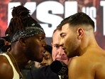 Boxing - X Series Press Conference - OVO Arena Wembley, London, Britain - August 22, 2023 KSI head to head with Tommy Fury as promoter Kalle Sauerland looks on during the press conference Action Images via Reuters/Andrew Boyers