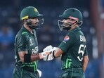 Pakistan's Iftikhar Ahmed (L) and Babar Azam bump their fists during a warm-up match between Pakistan and Australia ahead of the ICC men's cricket World Cup Pakistan's Iftikhar Ahmed (L) and Babar Azam bump their fists during a warm-up match between Pakistan and Australia ahead of the ICC men's cricket World Cup