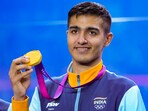 India squash player Abhay Singh poses for photos during the presentation ceremony of the men's team event at the 19th Asian Games India squash player Abhay Singh poses for photos during the presentation ceremony of the men's team event at the 19th Asian Games
