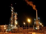 A Russian state flag flies on the top of a diesel plant in the Yarakta Oil Field, owned by Irkutsk Oil Company (INK), in Irkutsk Region, Russia.