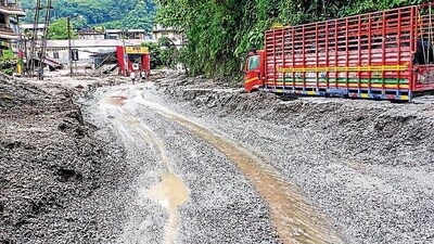 A truck is partially covered in mud due to flash floods triggered by a sudden heavy rainfall, in North Sikkim on Friday (ANI) A truck is partially covered in mud due to flash floods triggered by a sudden heavy rainfall, in North Sikkim on Friday (ANI)
