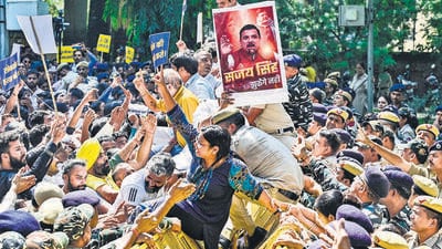 AAP workers on Thursday at a protest, a day after the arrest of the party’s Rajya Sabha MP Sanjay Singh. (Raj K Raj/HT photo) AAP workers on Thursday at a protest, a day after the arrest of the party’s Rajya Sabha MP Sanjay Singh. (Raj K Raj/HT photo)
