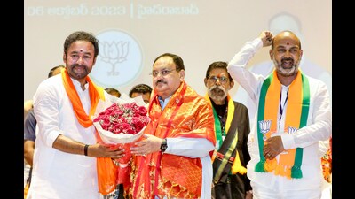 BJP National President J.P. Nadda being felicitated by Union Minister of Culture and Tourism G Kishan Reddy during the inaugural session of BJP State Council Meeting in Medchal-Malkajgiri on Friday. (JP Nadda Twitter) BJP National President J.P. Nadda being felicitated by Union Minister of Culture and Tourism G Kishan Reddy during the inaugural session of BJP State Council Meeting in Medchal-Malkajgiri on Friday. (JP Nadda Twitter)
