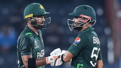 Pakistan's Iftikhar Ahmed (L) and Babar Azam bump their fists during a warm-up match between Pakistan and Australia ahead of the ICC men's cricket World Cup (AFP) Pakistan's Iftikhar Ahmed (L) and Babar Azam bump their fists during a warm-up match between Pakistan and Australia ahead of the ICC men's cricket World Cup (AFP)
