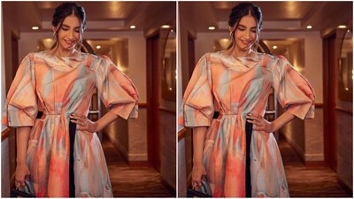 Her stunning silk dress is from the shelves of clothing brand Roksanda and comes with a price tag of <span class='webrupee'>₹</span>1.71 lakh, while her styling was expertly done by her fashion stylist sister Rhea Kapoor. (Instagram/@sonamkapoor) Her stunning silk dress is from the shelves of clothing brand Roksanda and comes with a price tag of <span class='webrupee'>₹</span>1.71 lakh, while her styling was expertly done by her fashion stylist sister Rhea Kapoor. (Instagram/@sonamkapoor)