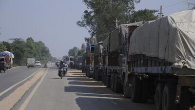 Gurgaon, India- Ocotber 19 : Trailers drivers parked all along the stretch take up much of the road space at Pataudi road,in Gurgaon, India, on Saturday, October 19, 2013.(Pic to go with road package story) (Photo by Parveen Kumar/Hindustan Times) Gurgaon, India- Ocotber 19 : Trailers drivers parked all along the stretch take up much of the road space at Pataudi road,in Gurgaon, India, on Saturday, October 19, 2013.(Pic to go with road package story) (Photo by Parveen Kumar/Hindustan Times)