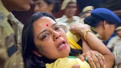 TMC MP Mahua Moitra being detained by the police personnel during a protest by the party delegation against the central government over the alleged denial of MGNREGA scheme funds to the West Bengal government at Krishi Bhavan, in New Delhi on Tuesday, (PTI)