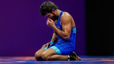 India's Bajrang Punia reacts after losing to Japan's Kaiki Yamaguchi in the men's freestyle 65kg category wrestling match for the bronze medal at the 19th Asian Games (PTI) India's Bajrang Punia reacts after losing to Japan's Kaiki Yamaguchi in the men's freestyle 65kg category wrestling match for the bronze medal at the 19th Asian Games (PTI)