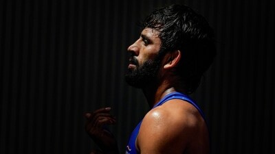Bajrang Punia reacts after losing to Japan's Kaiki Yamaguchi in the men's freestyle 65kg category wrestling match for the bronze medal at the 19th Asian Games (PTI) Bajrang Punia reacts after losing to Japan's Kaiki Yamaguchi in the men's freestyle 65kg category wrestling match for the bronze medal at the 19th Asian Games (PTI)