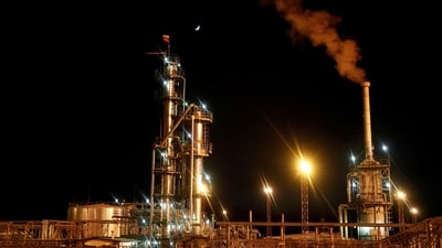 A Russian state flag flies on the top of a diesel plant in the Yarakta Oil Field, owned by Irkutsk Oil Company (INK), in Irkutsk Region, Russia. (REUTERS)