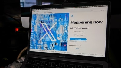 A view of a laptop shows the Twitter sign-in page with their the new logo. (AP)