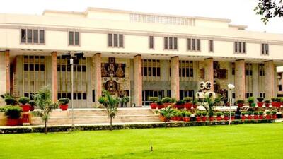 The compensation amount will be recovered from the salaries of the two police officers. (Delhi High Court) The compensation amount will be recovered from the salaries of the two police officers. (Delhi High Court)