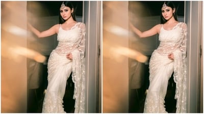 Assisted by makeup artist Mukesh Patil, Mouni decked up in nude eyeshadow, black eyeliner, black kohl, mascara-laden eyelashes, drawn eyebrows, contoured cheeks and a shade of nude lipstick. (Instagram/@imouniroy) Assisted by makeup artist Mukesh Patil, Mouni decked up in nude eyeshadow, black eyeliner, black kohl, mascara-laden eyelashes, drawn eyebrows, contoured cheeks and a shade of nude lipstick. (Instagram/@imouniroy)